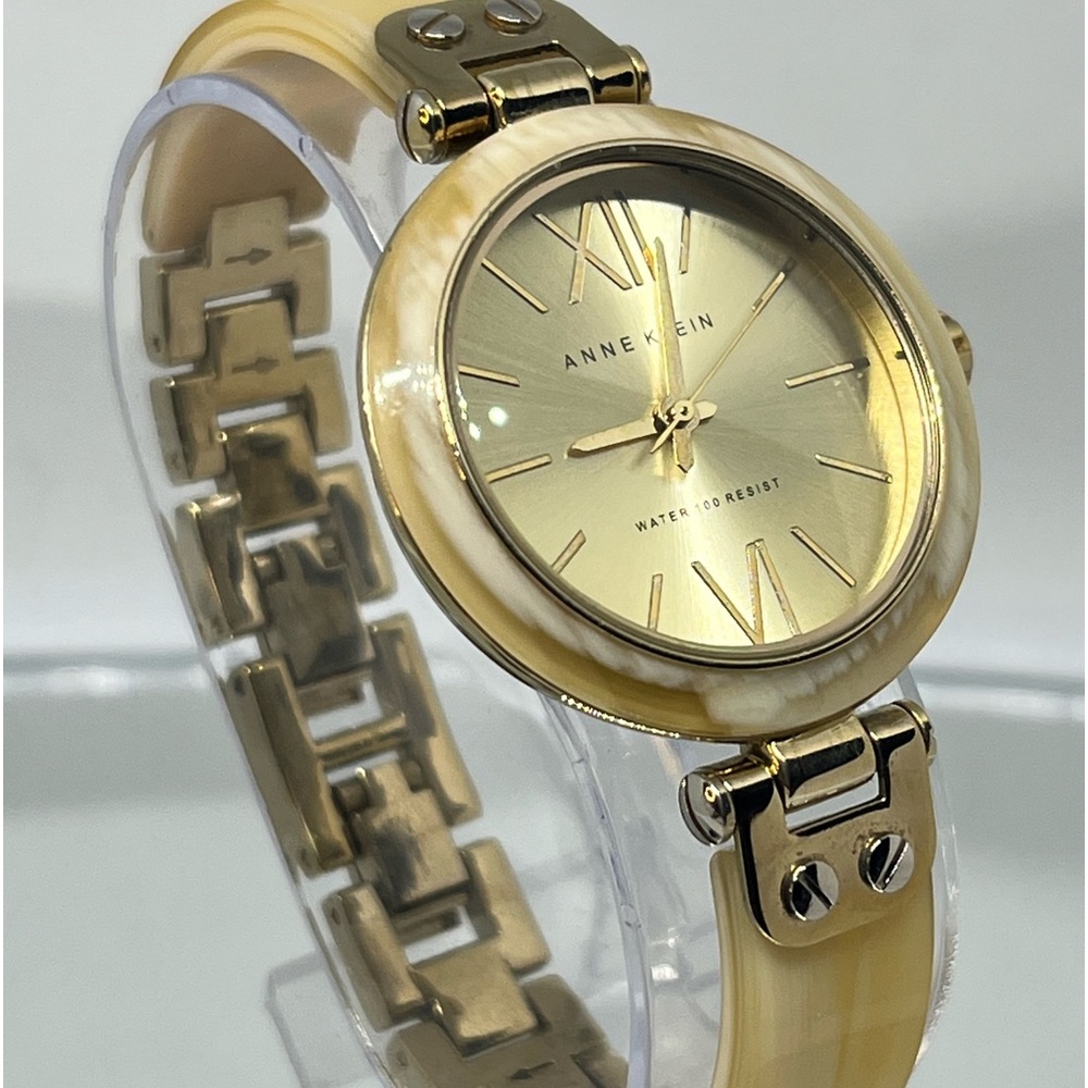 ANNE KLEIN! Very unique acrylic and gold band with multi toned bezel size 6 1/4